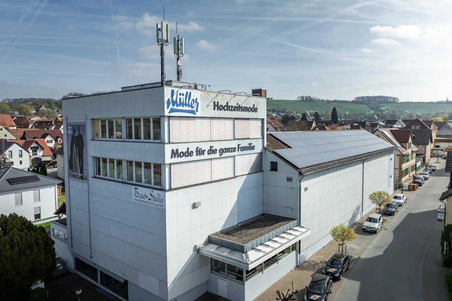 Kleider Müller Gebäude Gundelsheim von Außen